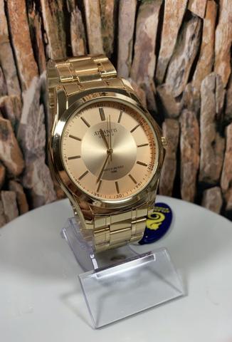 Lindo relógio Atlantis dourado com desconto pra hoje.