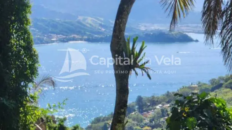 TERRENO COM ESCRITURA DEFINITIVA PRÓXIMO A PRAIA