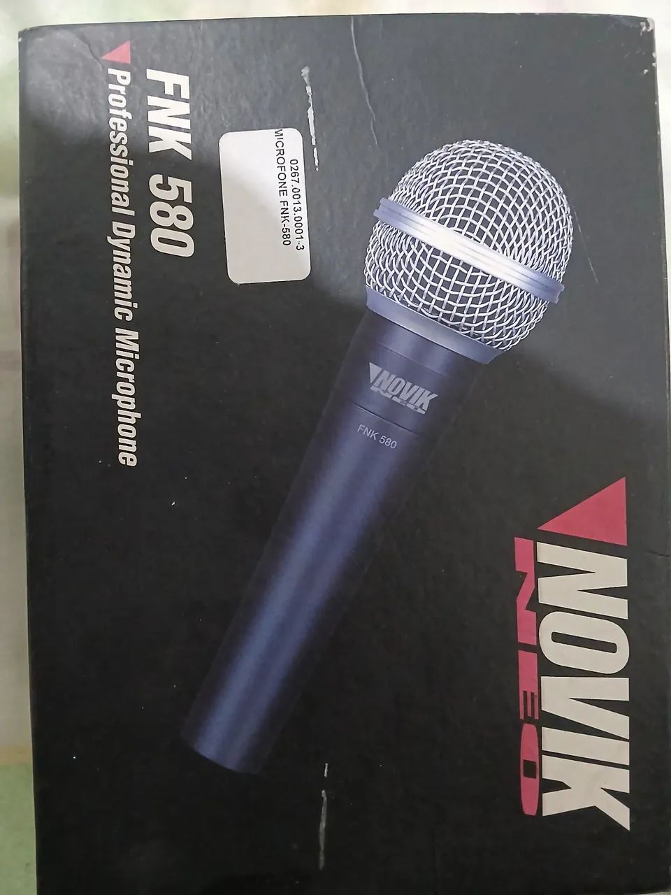 Caixa de som , microfone com fio e outro microfone sem fio