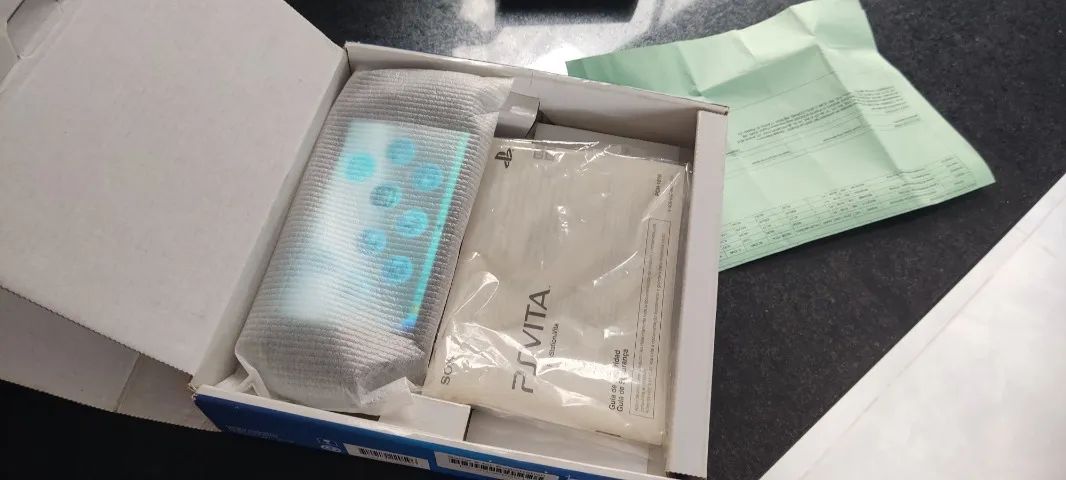 PS VITA na caixa + extras - Foto 5