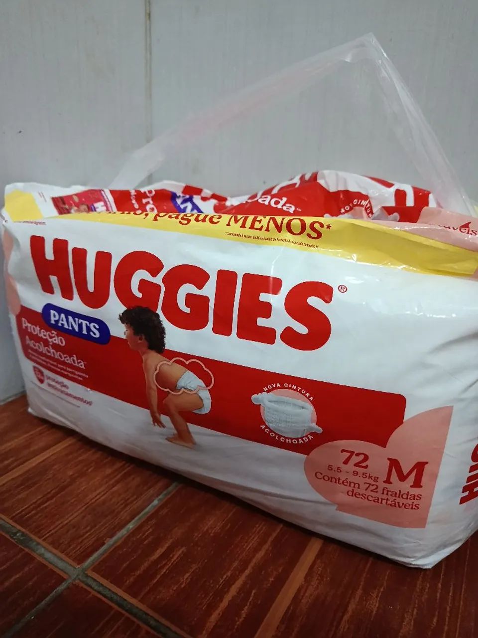 Fralda Huggies M 