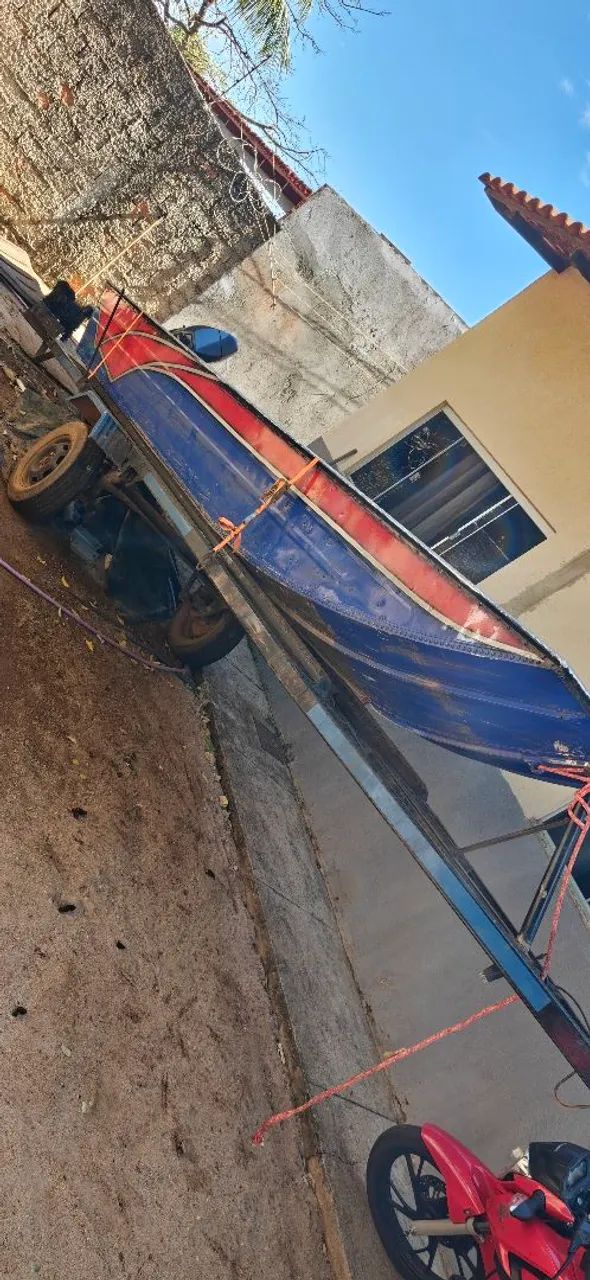 Canoa com motor e carretinha  - Foto 2