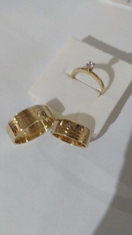 Par aliança moeda antiga e solitário noivado ou casamento