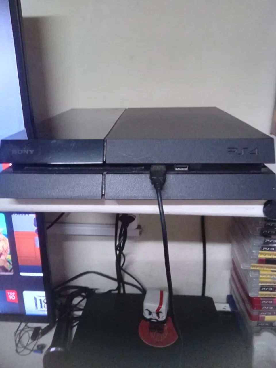 PS4 fat 2014 com caixa e manuais + 3 controles - Foto 3