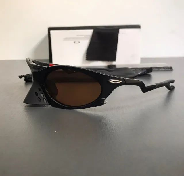 óculos de sol oakley plantaris coffe black - Foto 2