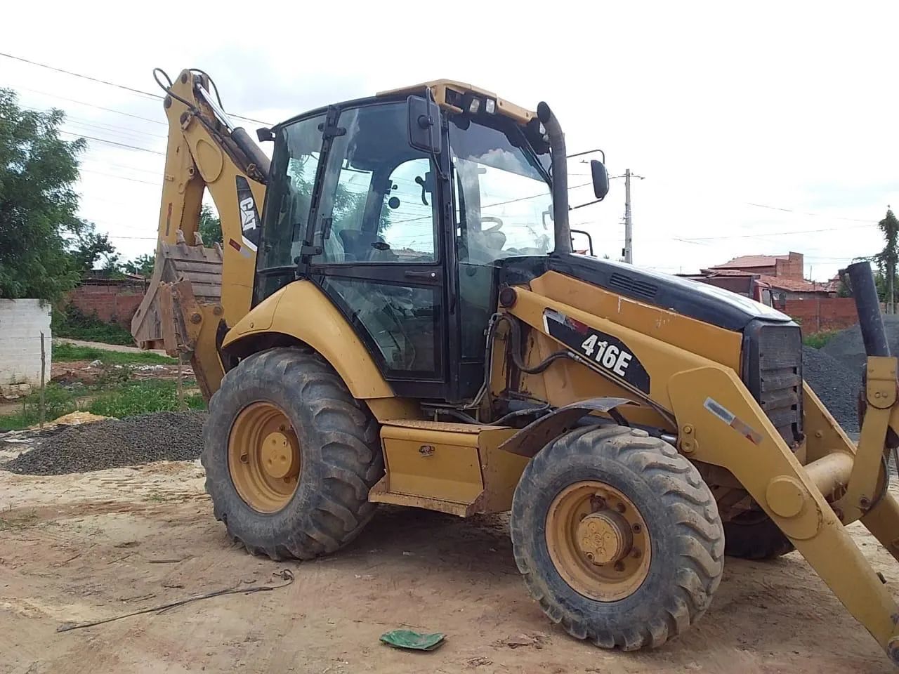 Retroescavadeira CAT 416 E .