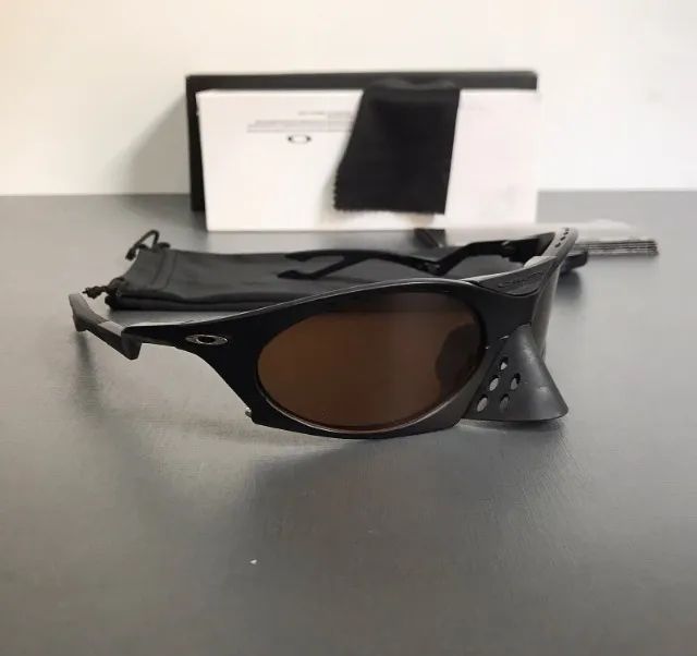 óculos de sol oakley plantaris coffe black - Foto 5