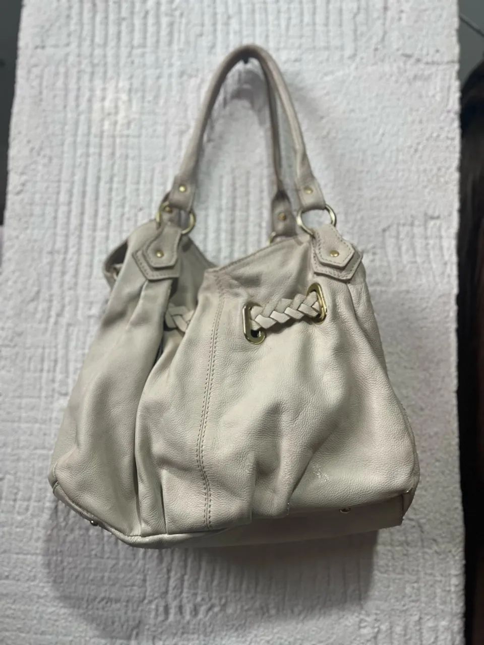 Bolsa le postiche de couro