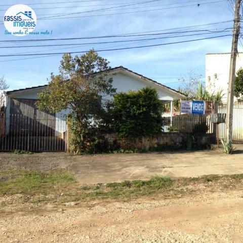 Terreno com 2 casas em otina localização
