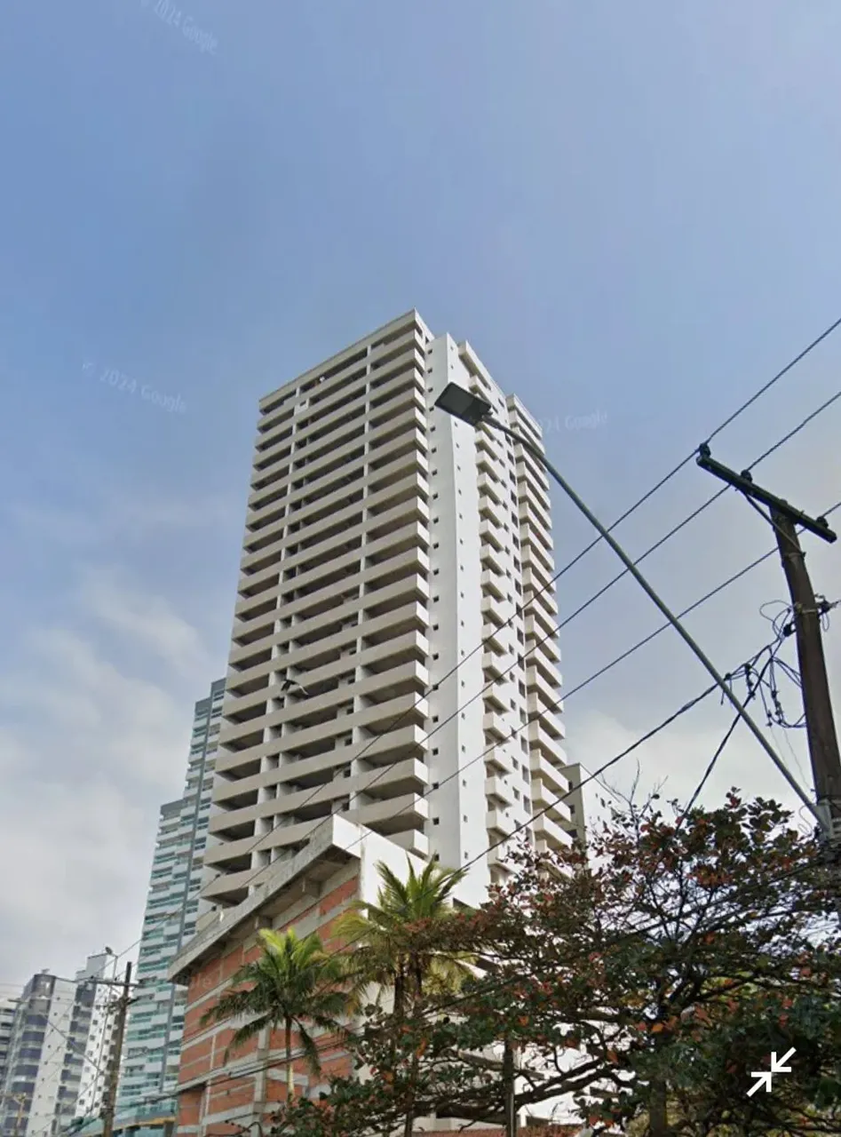 Frente mar 2 suites e 2 vagas bairro Maracanã praia grande.