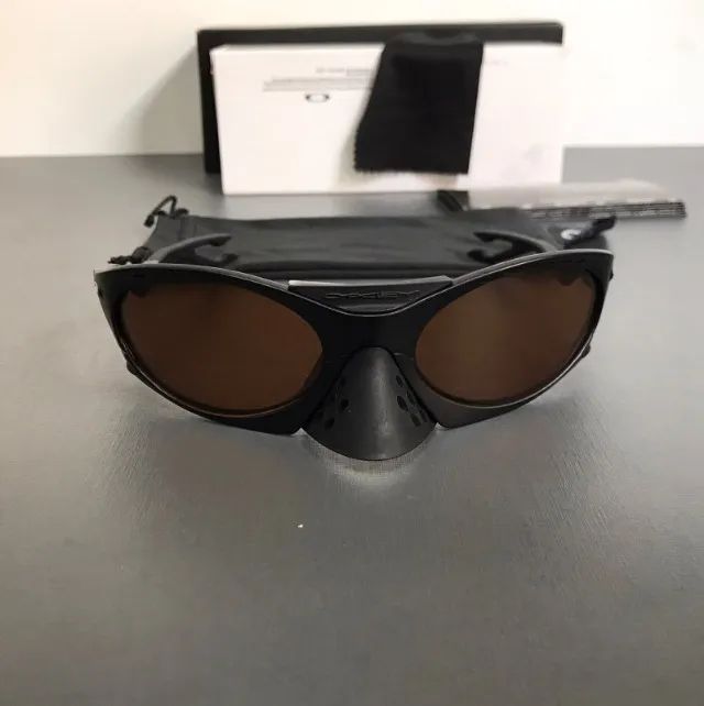óculos de sol oakley plantaris coffe black - Foto 3