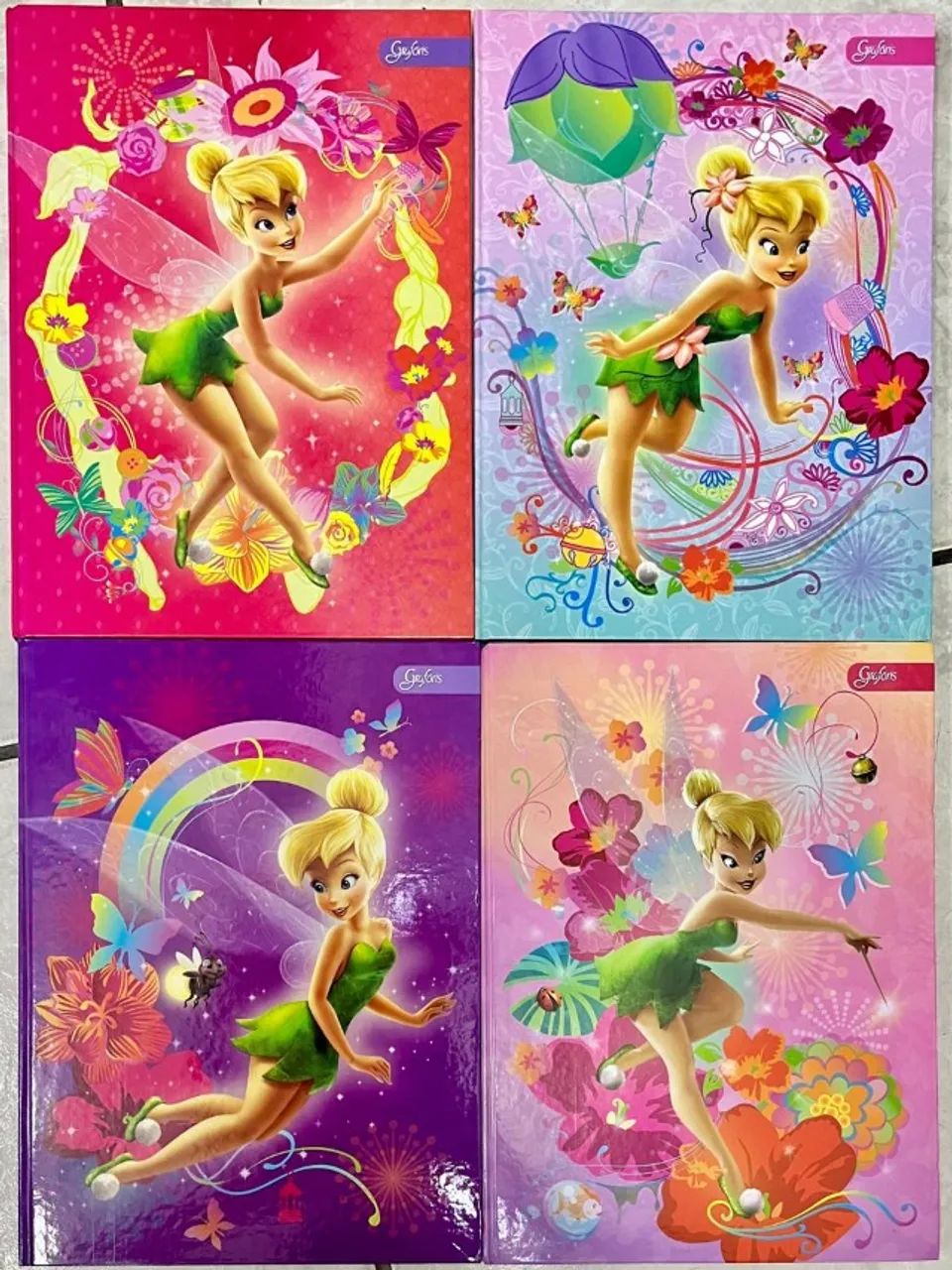Caderno Tinker Bell brochura c/ adevisos e folhas decoradas