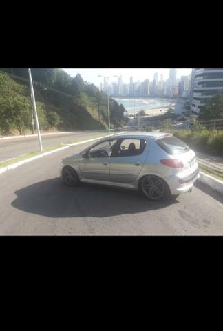 Vendo ou troco Peugeot 207Quiksilver completo - Foto 4