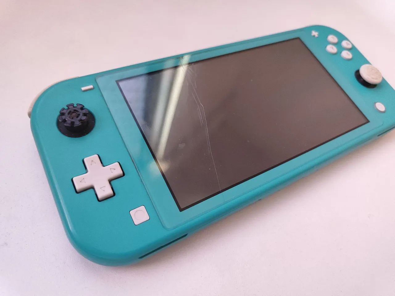 NINTENDO SWITCH LITE USED64318473496705120