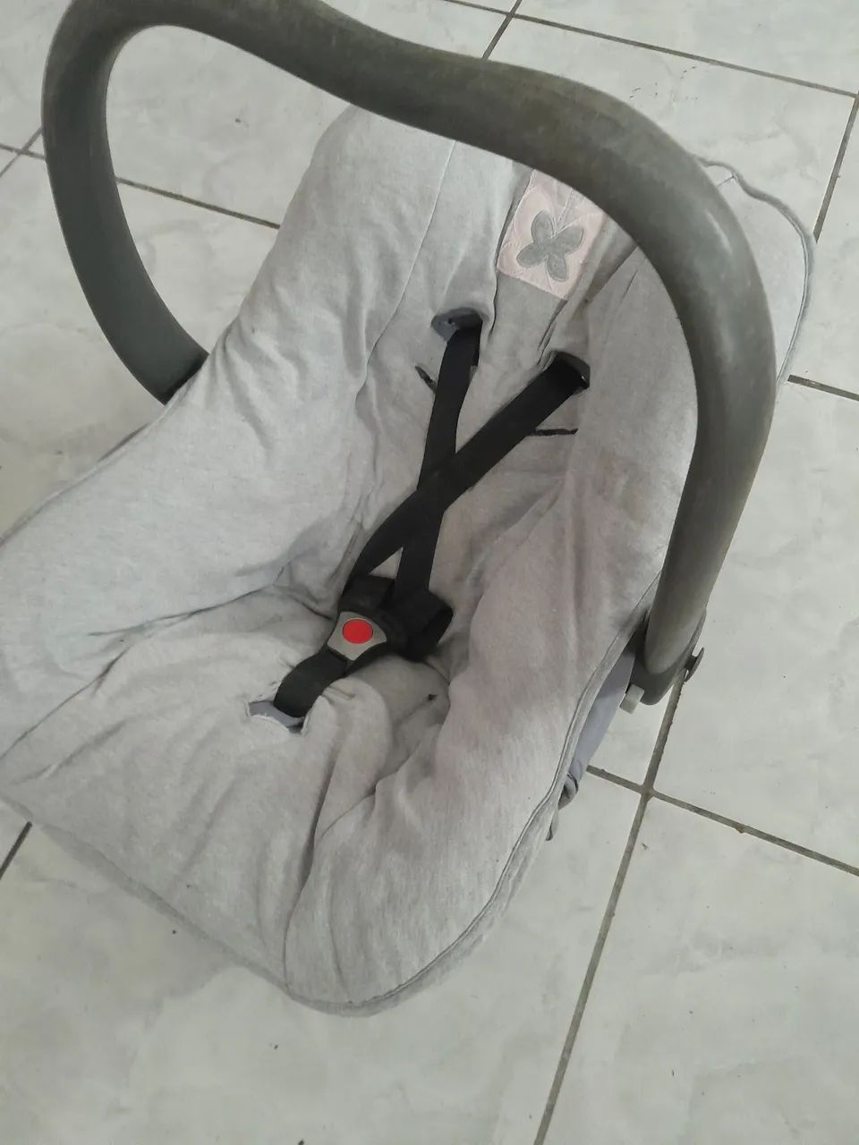 Bebê conforto com capa protetora 