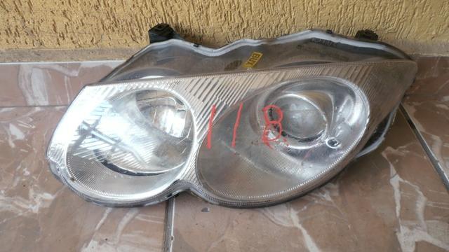 Farol esquerdo Chrysler 300M