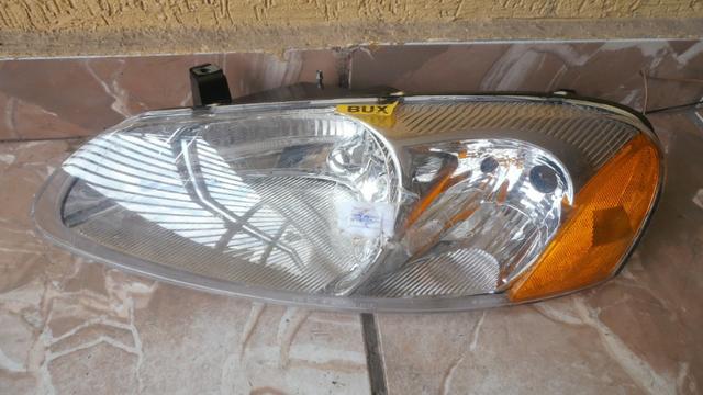 Farol esquerdo chrysler cbring