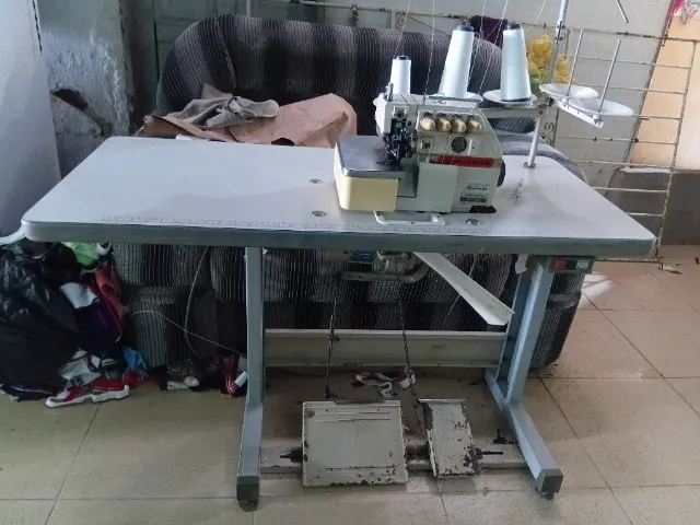 Maquina de costura Interlock, valor a conversar