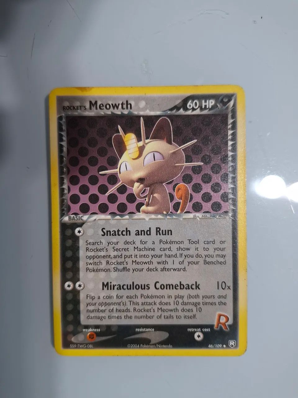 Carta Pokemon Rocket's Meowth 46/109
