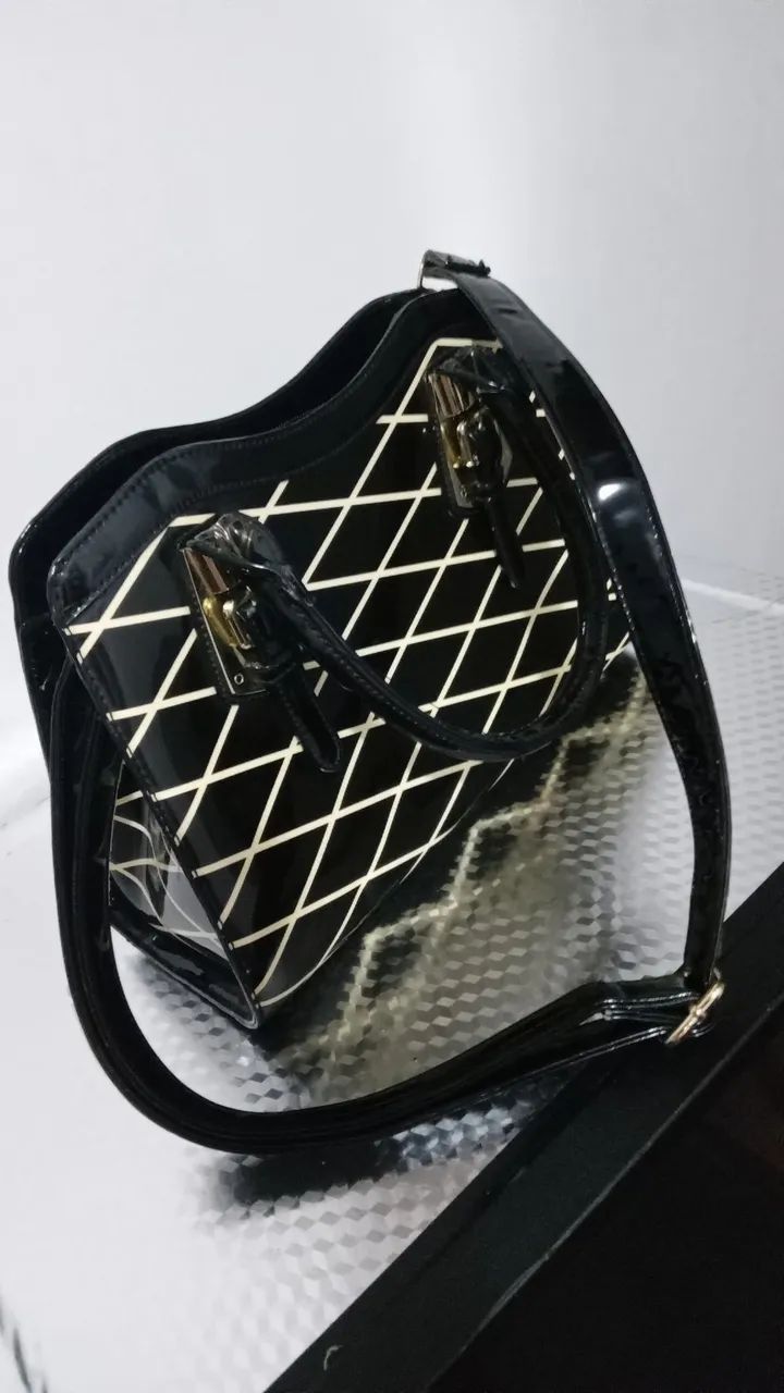 Bolsa de mão  e ombro  nova