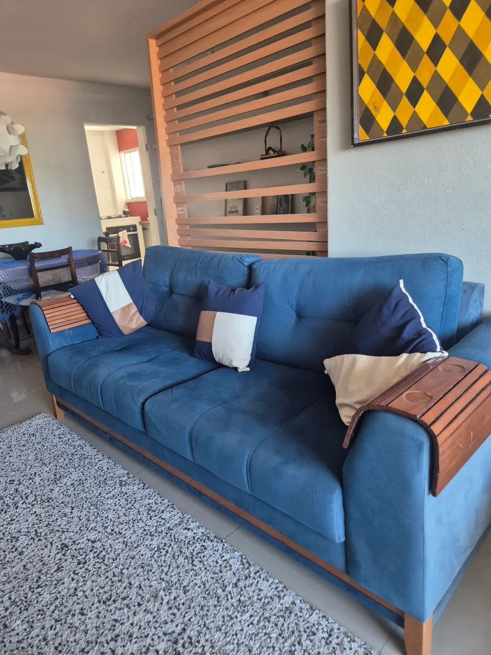 Vendo lindo sofá  cor azul espumas ortopédica  designer  moderno e excelente  qualidade 