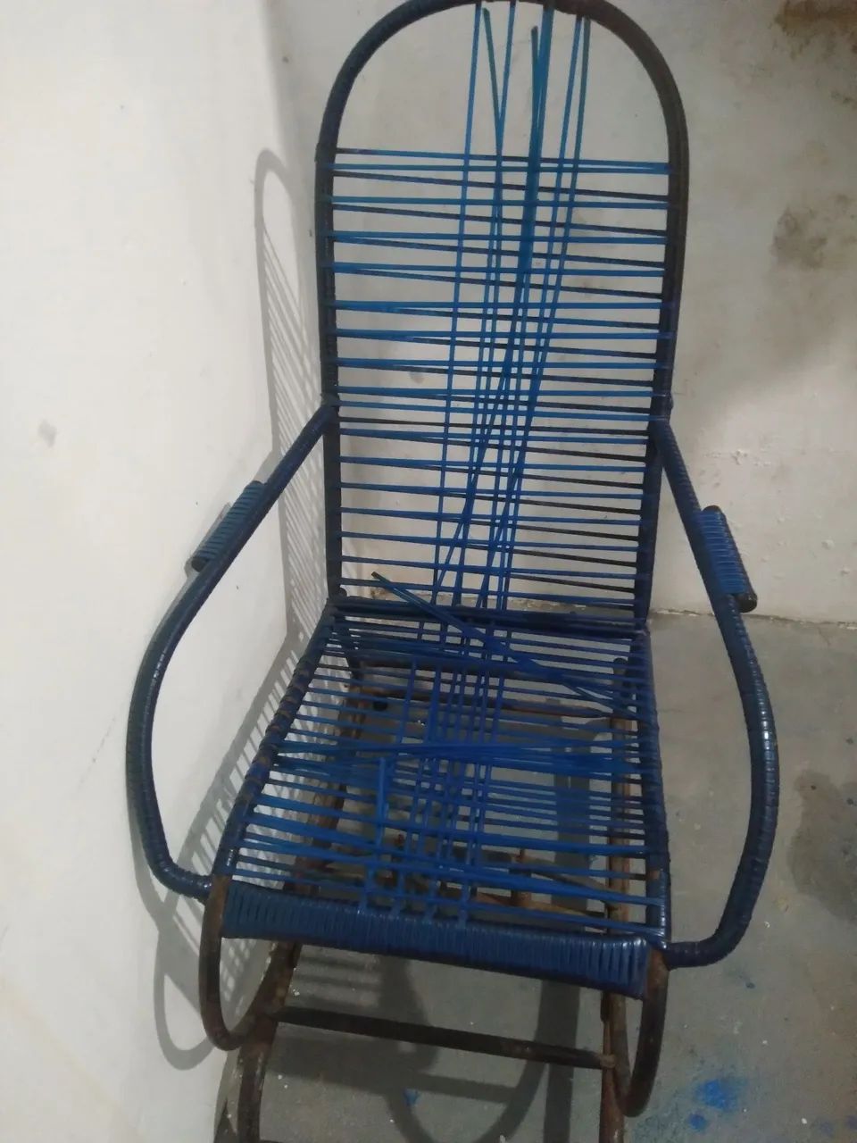 Cadeira de balanço com avaria