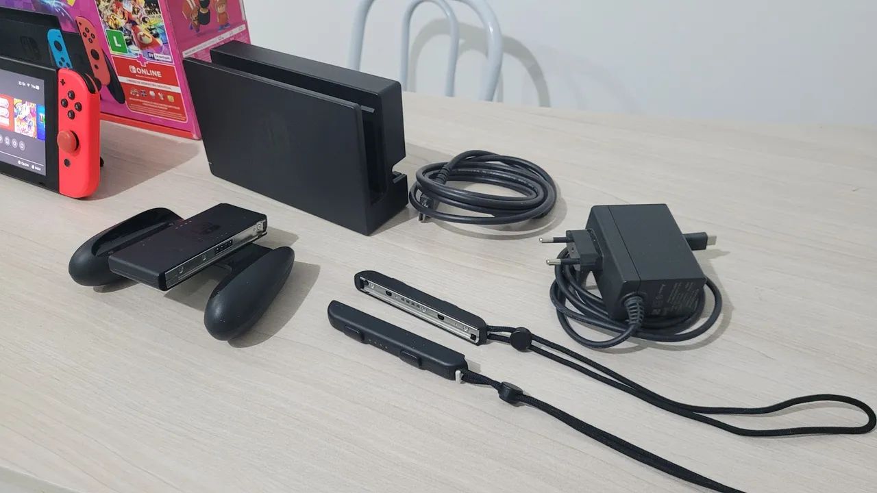 Nintendo Switch + jogos + acessório - Foto 4