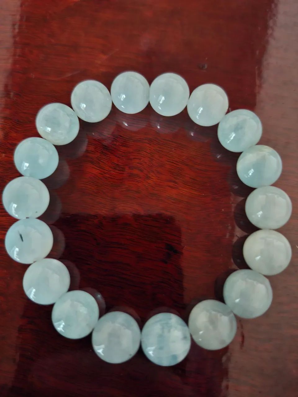 Pulseira de Jade com pedras de  15mm e 15 esferas.