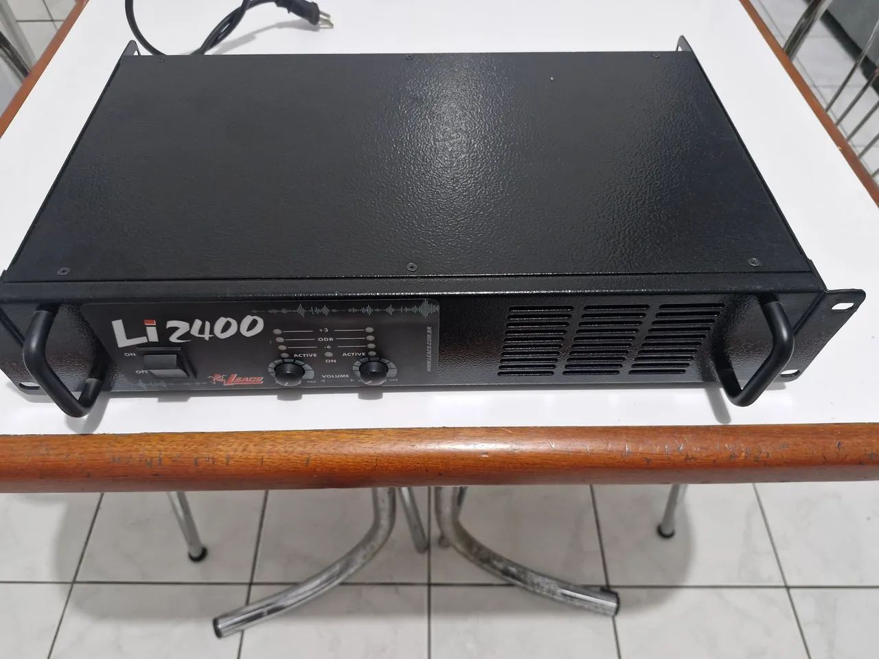 Potência li2400 seminova .