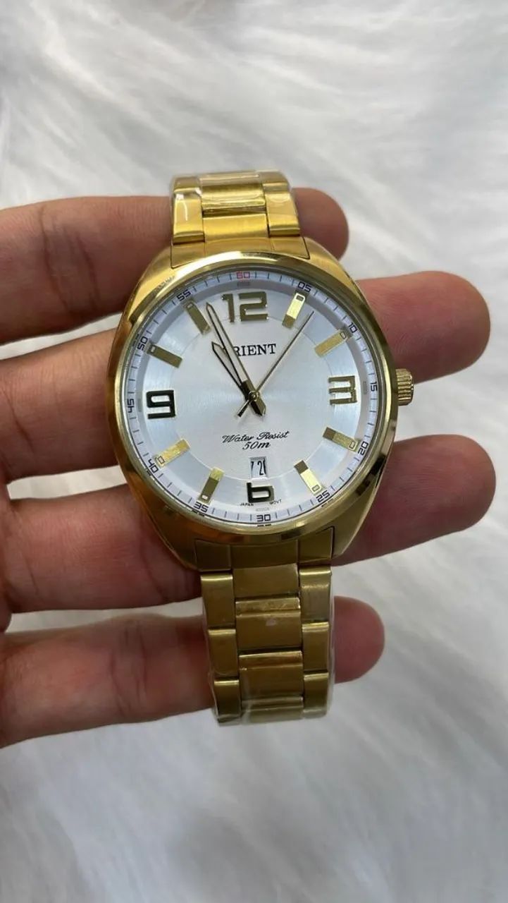 Relógio Dourado Orient com 1 ano de garantia 