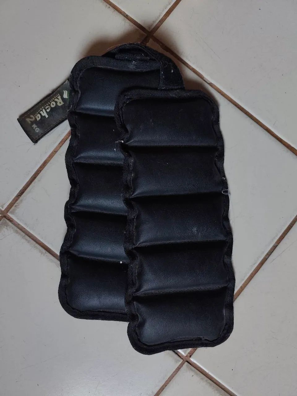 Caneleira e peso de tornozelo 