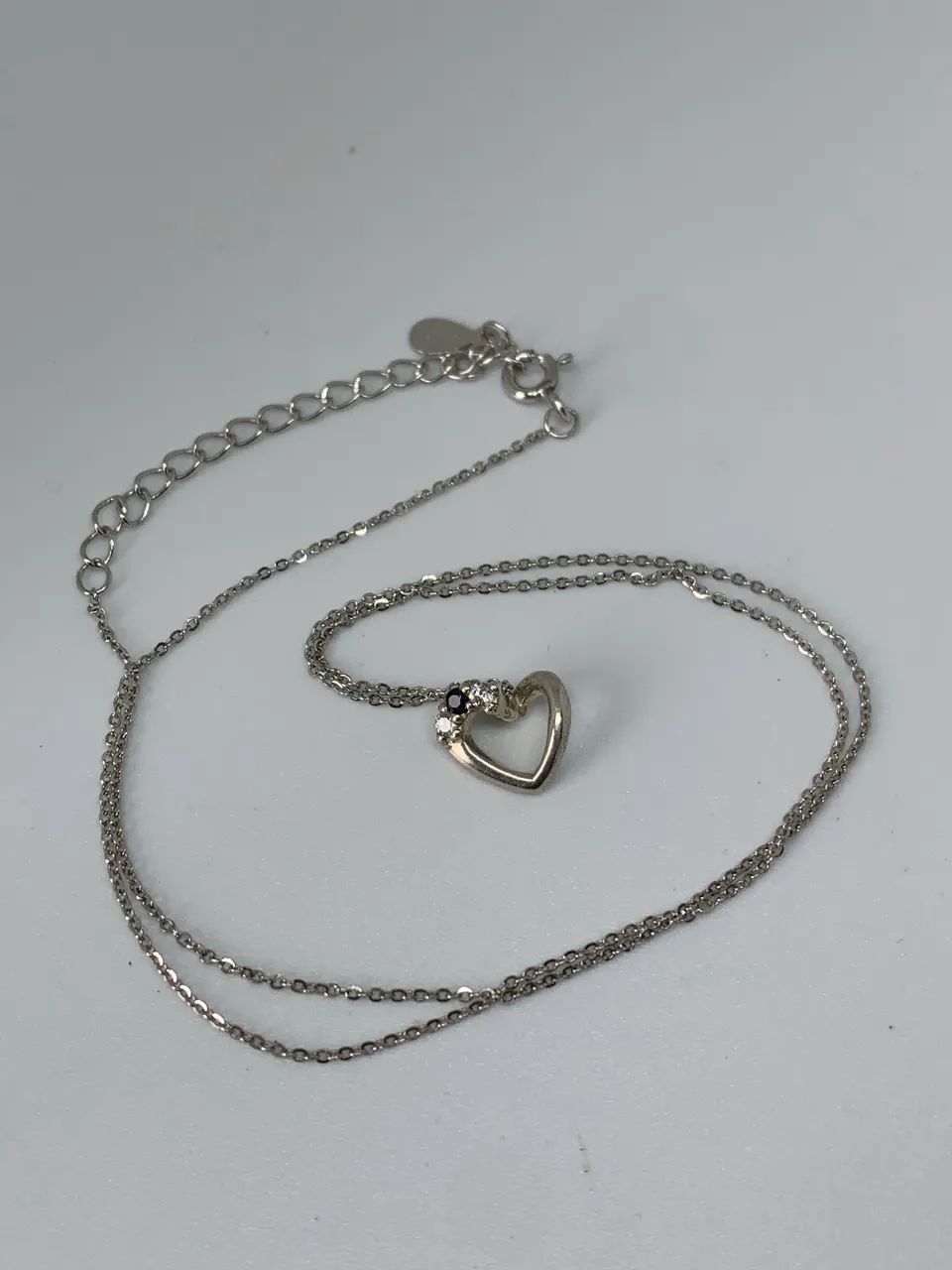 colar de prata com pingente de coração