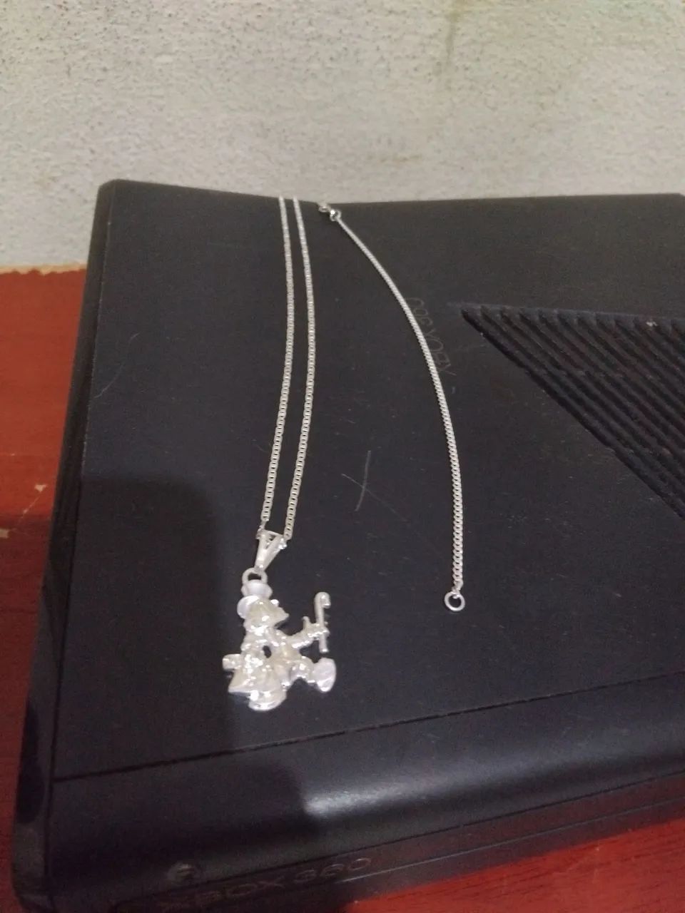 Cordão e pulseira de prata