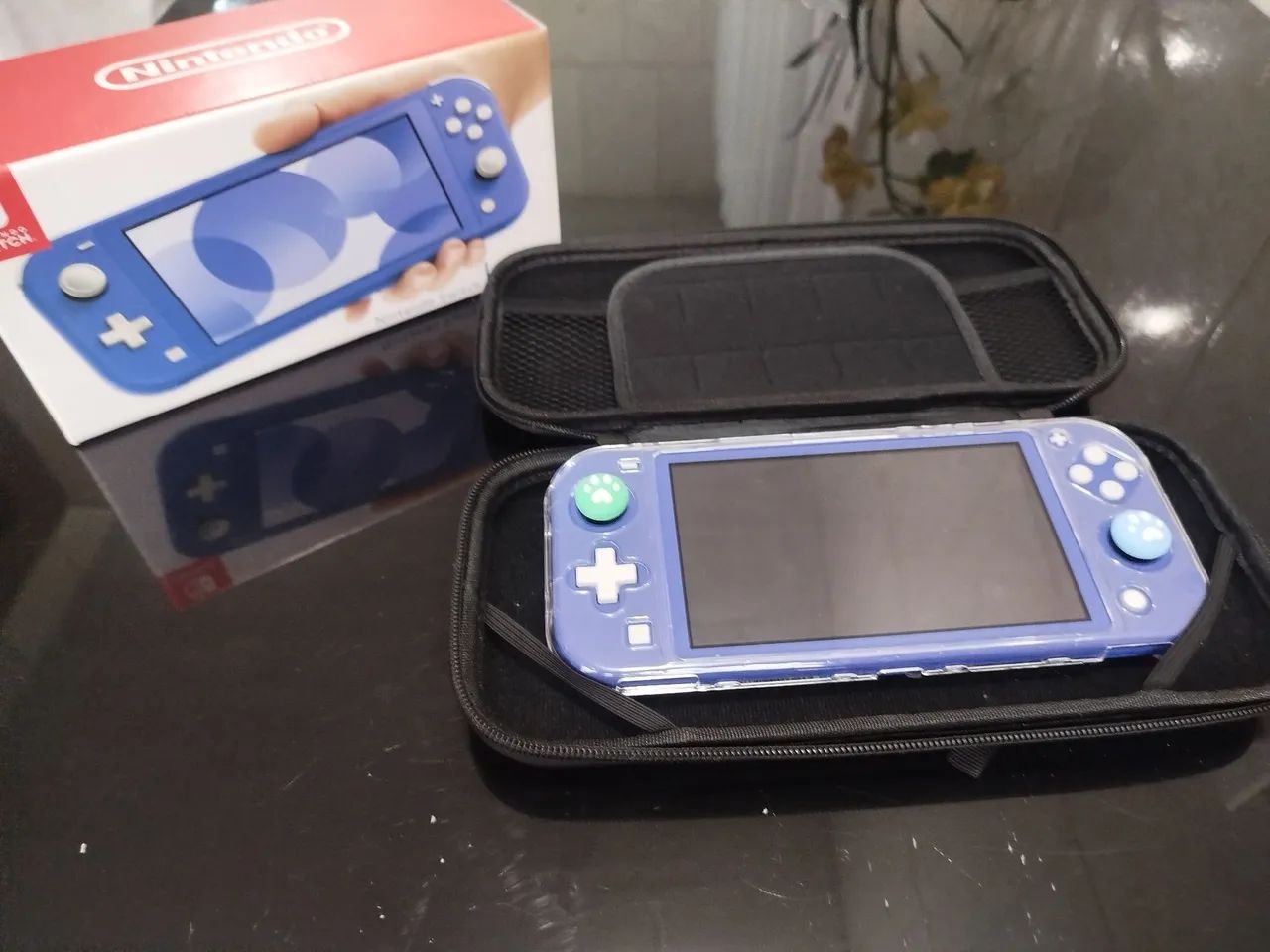 Nintendo Switch Lite com acessórios