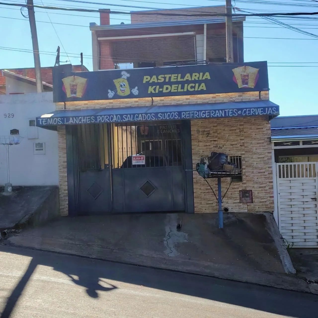 Toldo azul aproximadamente 3 metros placa de pastelaria 