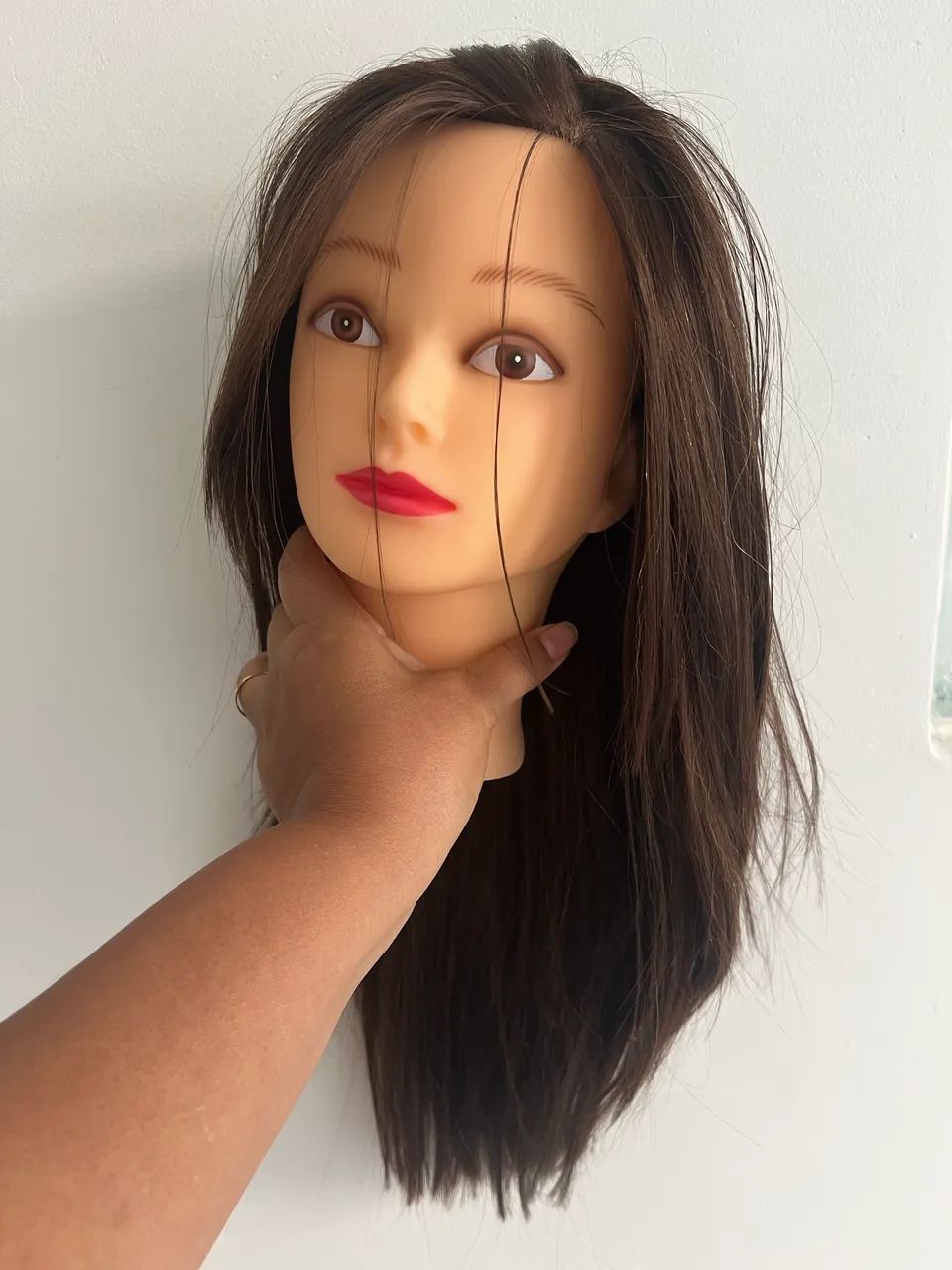 Cabeça de boneca para treino 