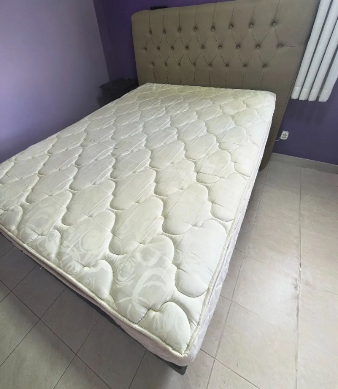Box bed with upholstered headboard