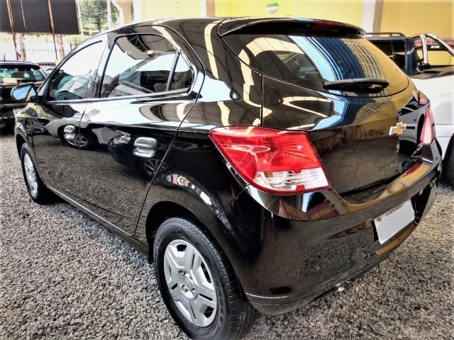 Gm - onix completo baixa km,1 dono,dh,ac,vte,air bag,dvd,estepe s/ uso,impecavel,placa a - Foto 19