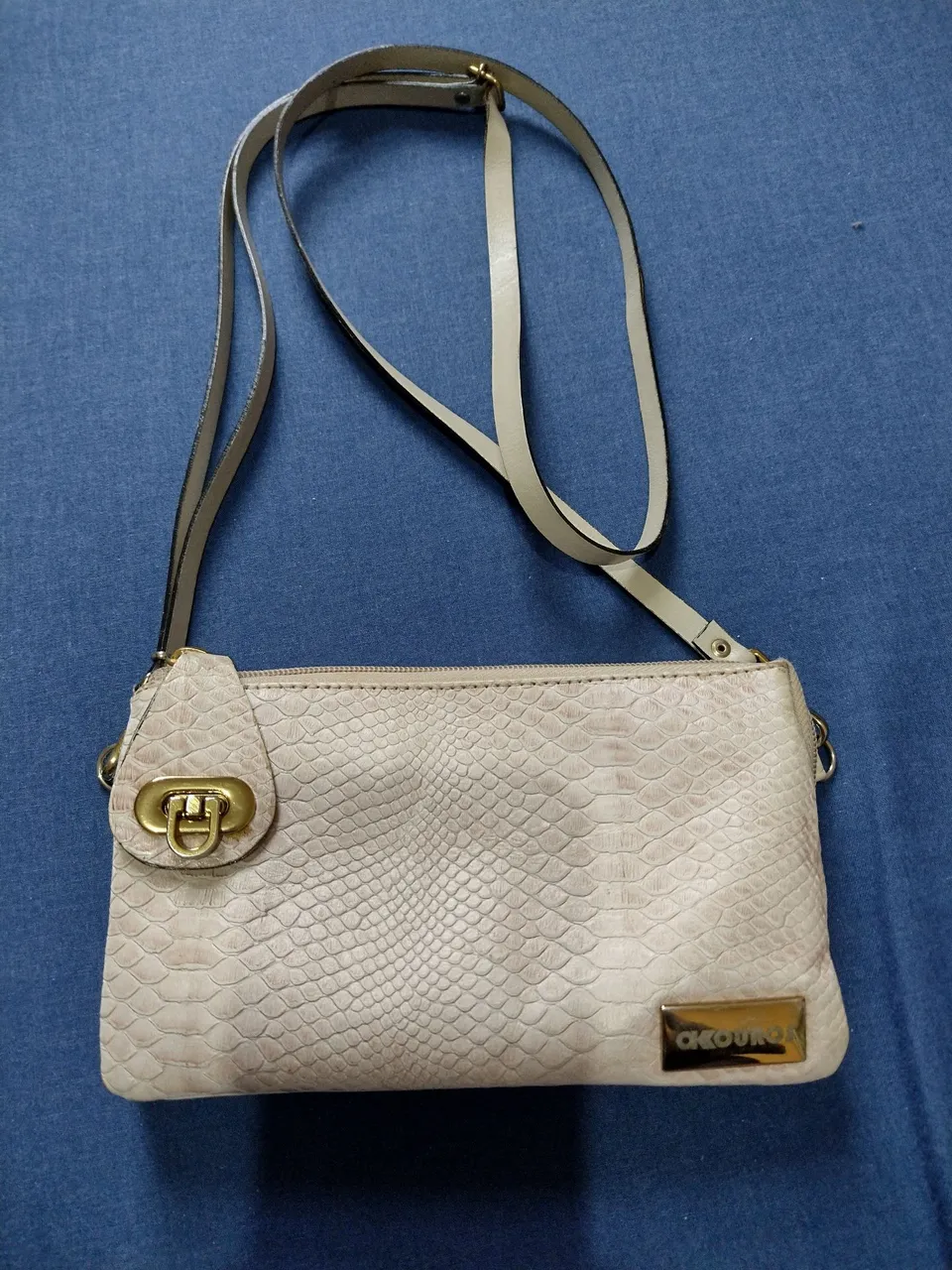 Bolsa de ombro em couro bege
