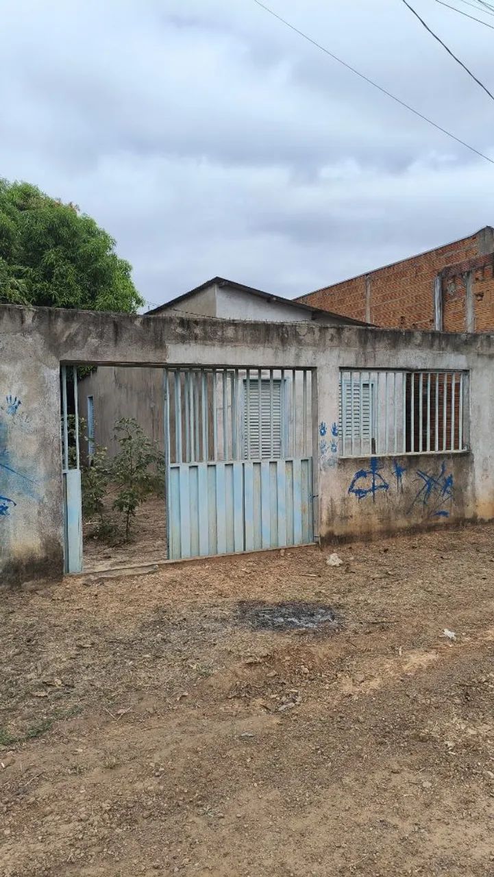 Casa em 2 terrenos 