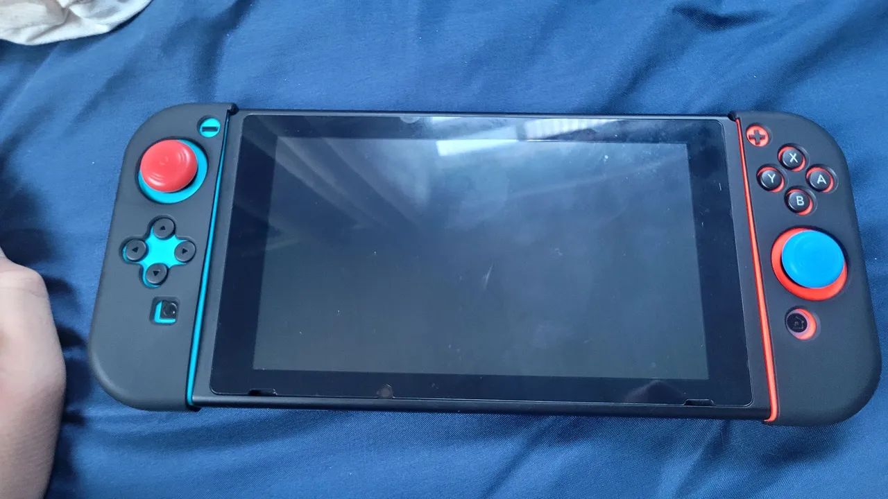 Nintendo switch e acessórios + jogo - Consoles de Vídeo Game