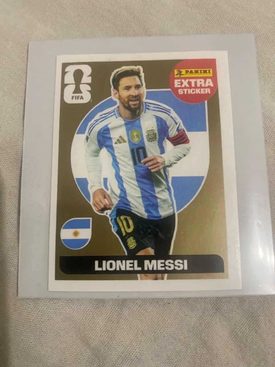 figurinha extra sticker do Messi ouro 