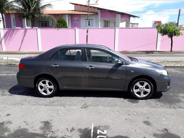 Toyota Corolla XEI automático, couro, completo, super novo - Foto 12