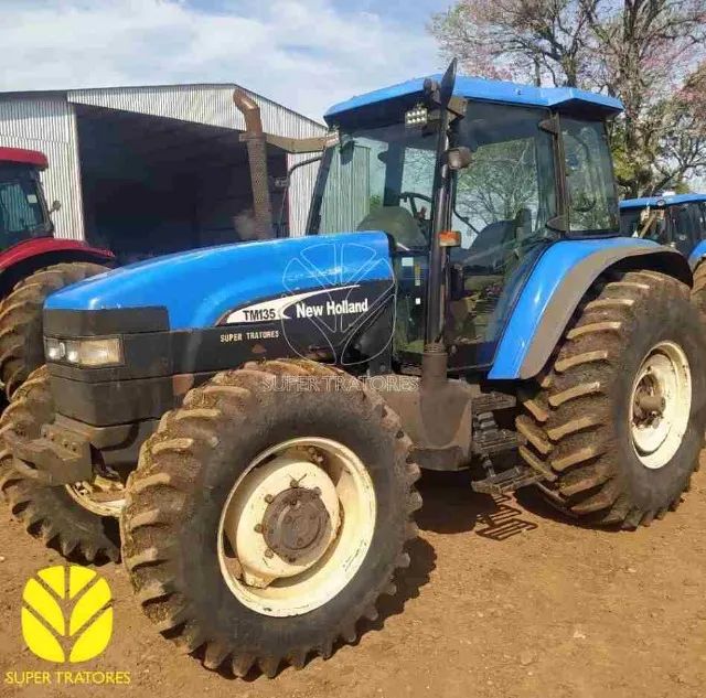 Trator New Holland TM 135 ano 2002.