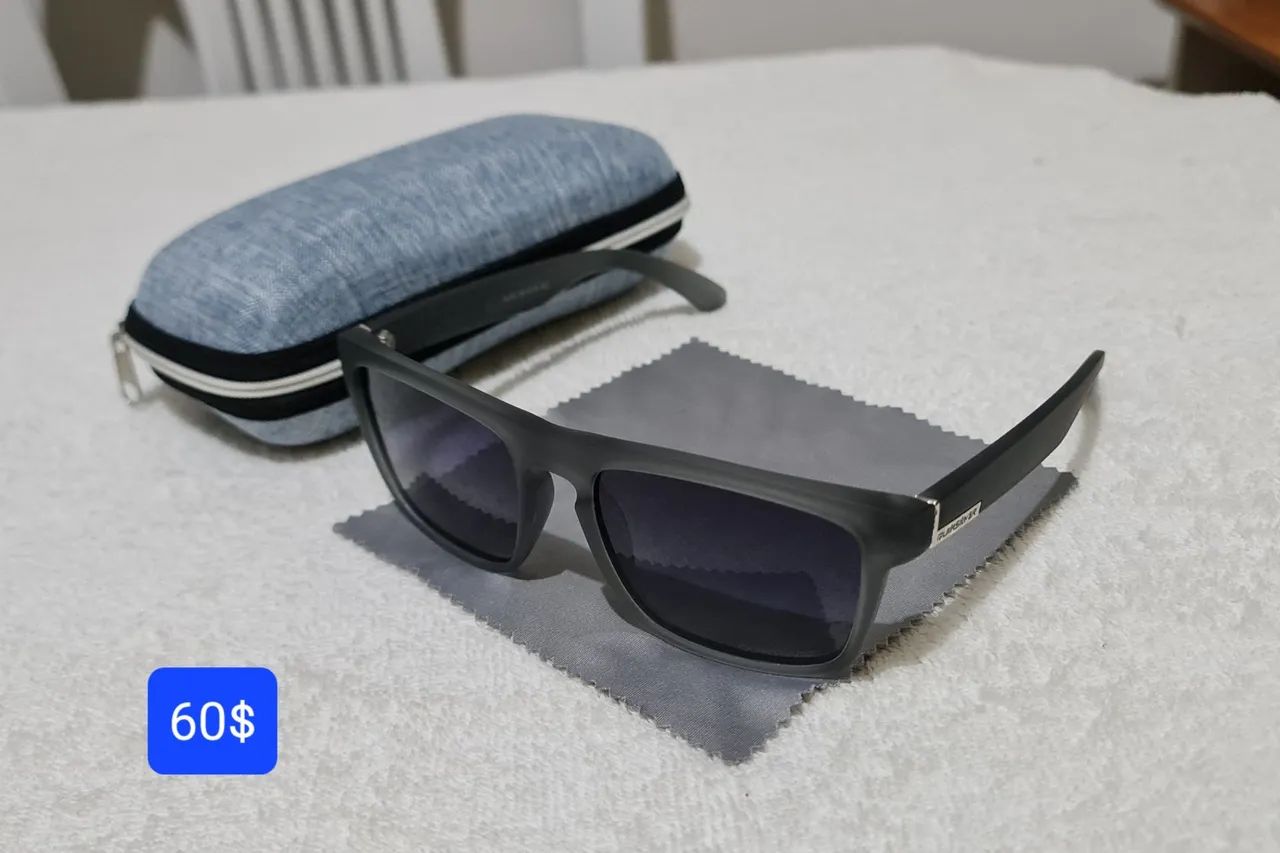 Óculos da Quiksilver cinza polarizado original 