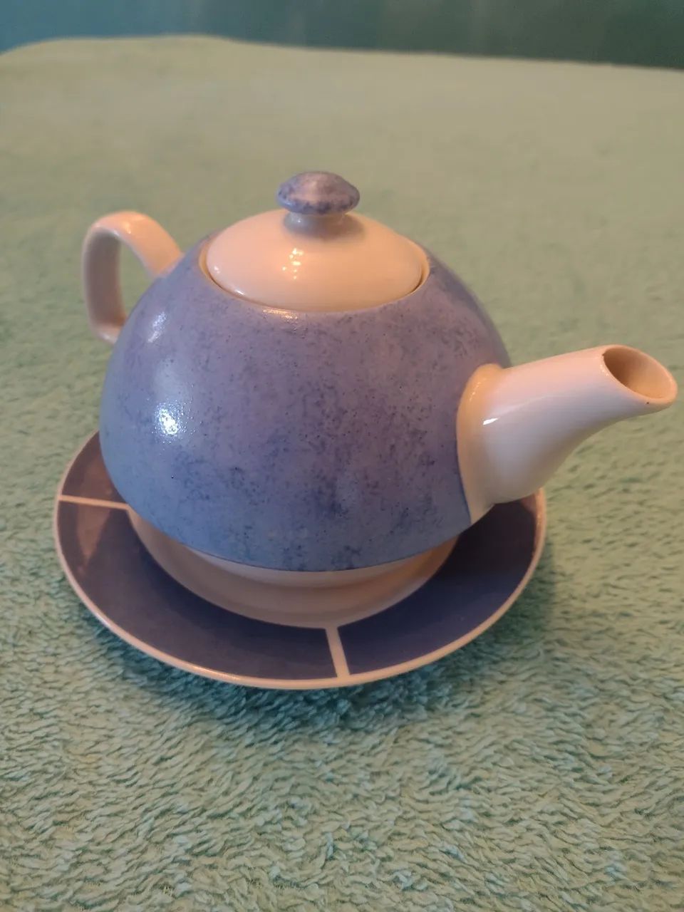Bule de porcelana azul com pires