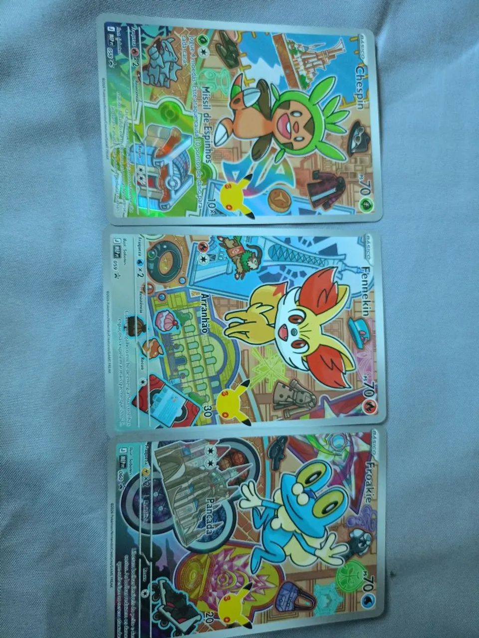Três cartas pokémon 