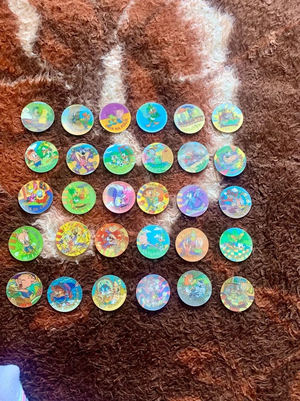 Pacote com 63 tazos diversos