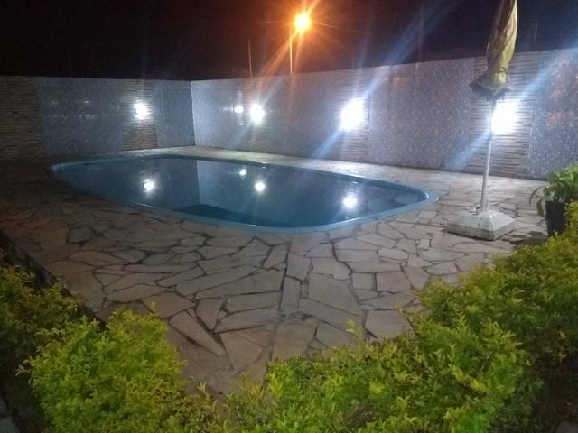 Troco casa com piscina Praia de Leste por Outra Enseada sc