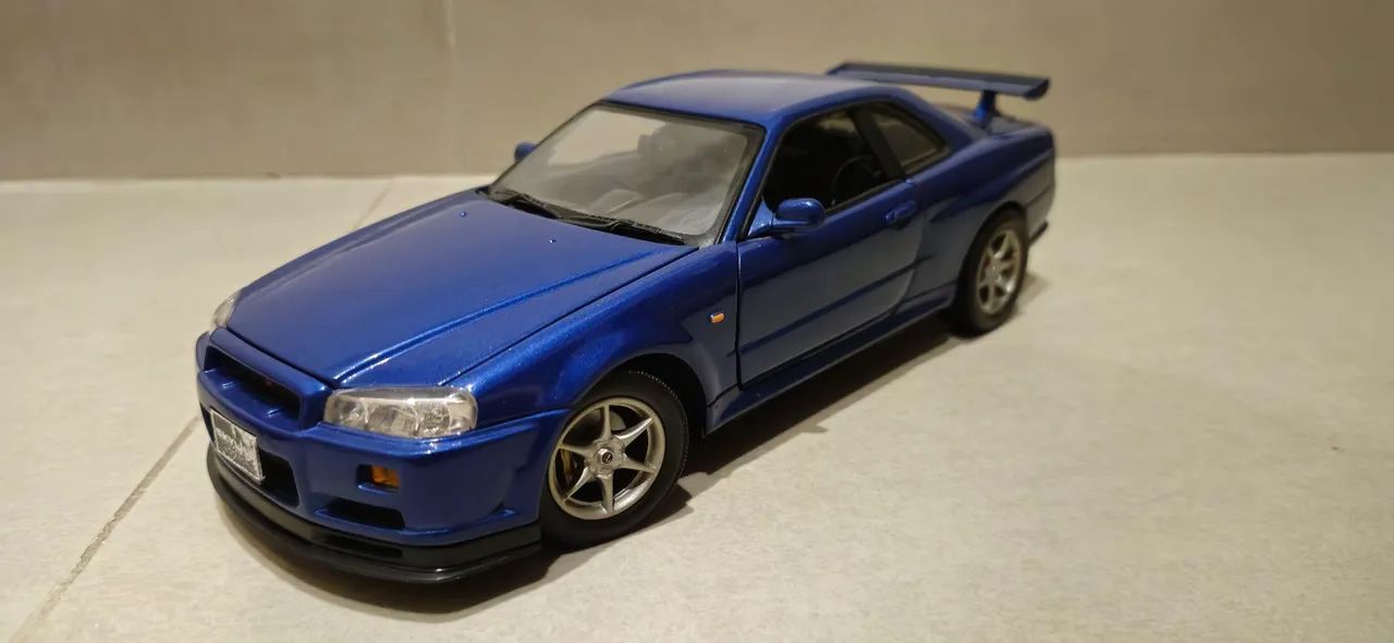 Nissan Skyline GT-R R34- miniatura 1/18